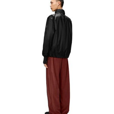 Wasserdichte Unisex-Jacken von Rains – Kauto Insulated Jacket – Schwarz